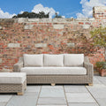 Capri Collection Outdoor Three Seater Sofa in garden