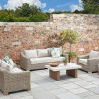 Capri Collection Outdoor Three Seater Sofa in garden